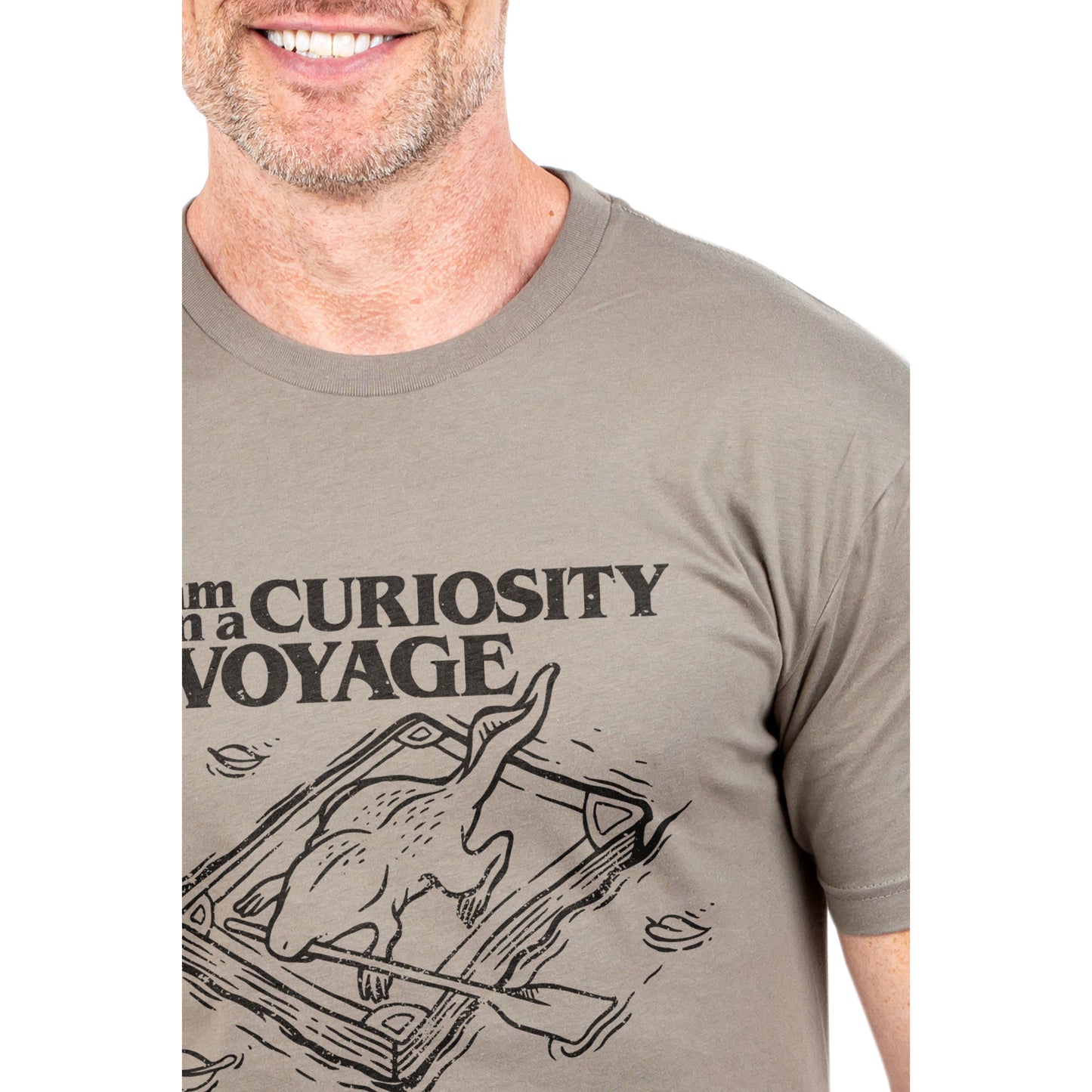 I Am On A Curiosity Voyage And I Need My Paddles To Travel Printed Graphic Men's Crew T-Shirt Heather Tan Closeup Image