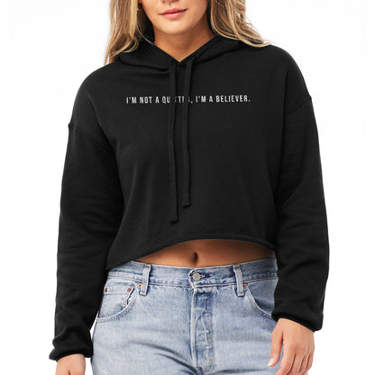 I'm Not a Quitter, I'm a Believer Cropped Hoodie Solid Black Model Image